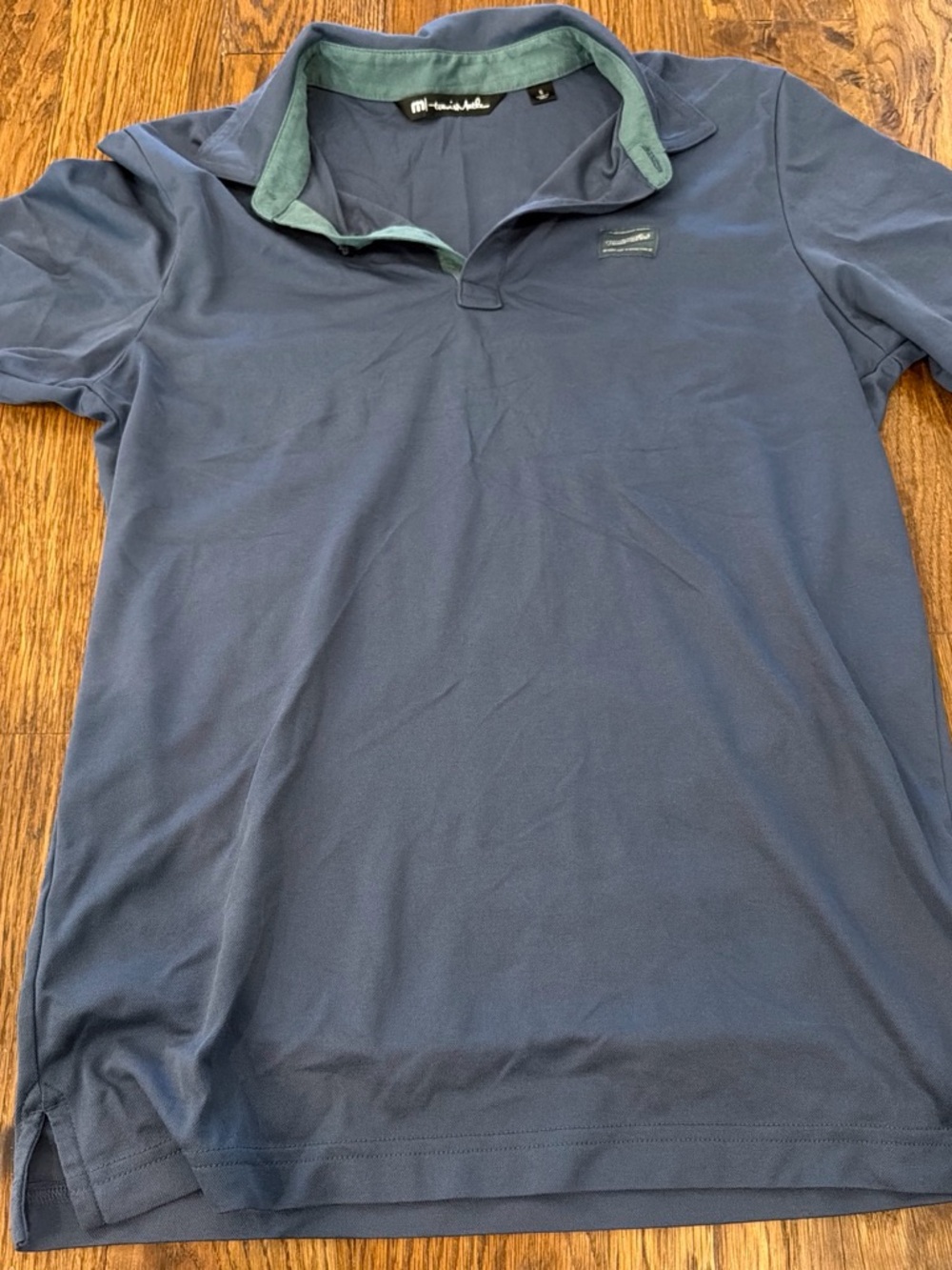 TravisMathew Men's Navy Polo with Contrasting Teal Inner Collar